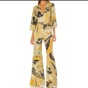 Free People Yellow and Black Floral Jumpsuit Wide-Leg Design